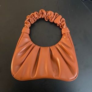JE PEI small purse. Never used